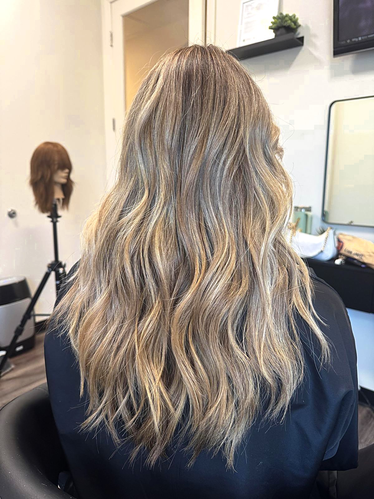 Blonde balayage waves, back view