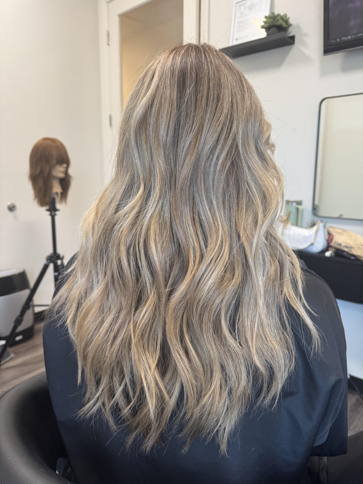 Blonde balayage waves, back view