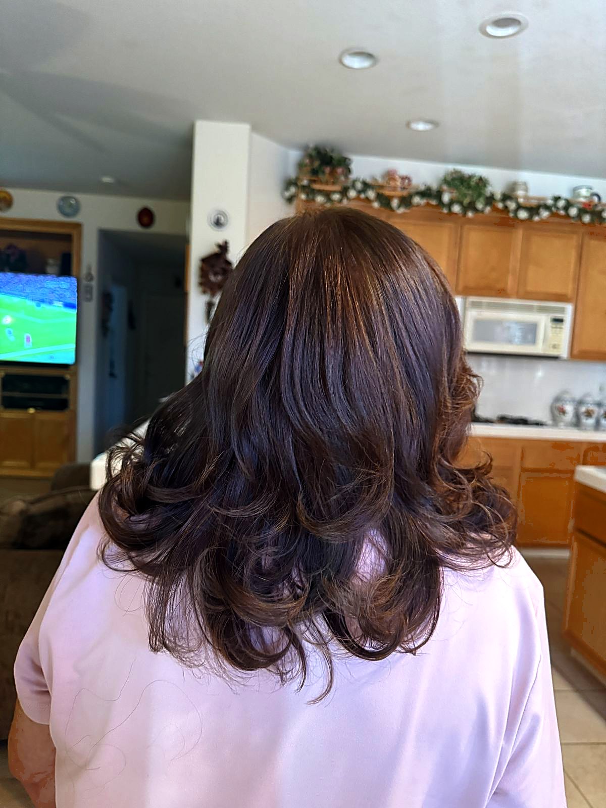 Brown curls, back view