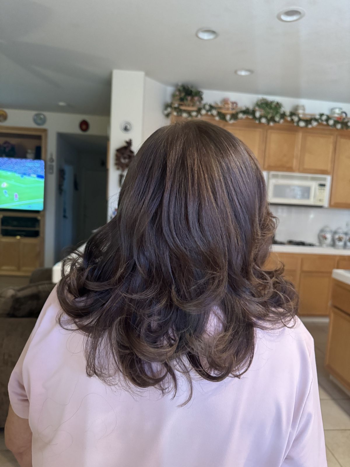 Brown curls, back view